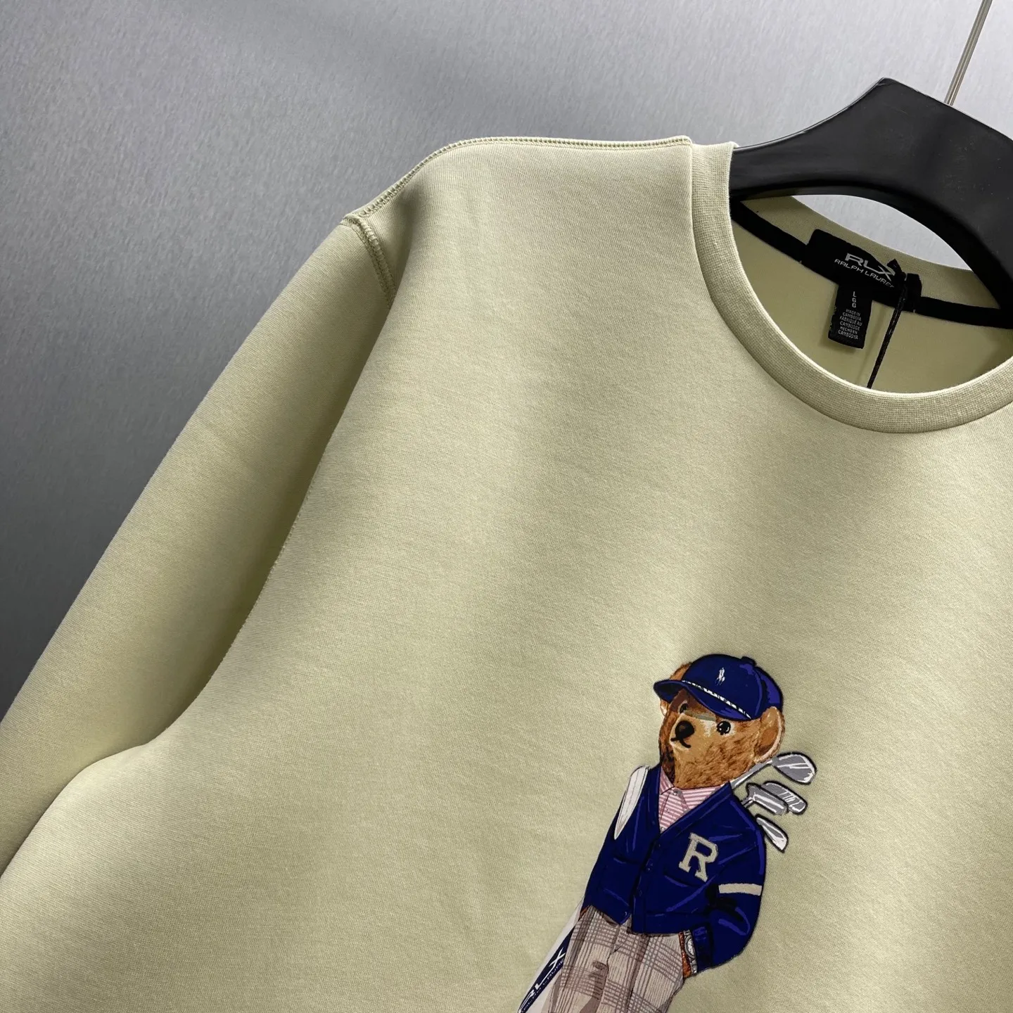 P350 🧧LRX Ralph Lauren Bear Sweatshirt Size: S-XL Carefully made in Italy, this sweatshirt is decorated with an elegant Polo Bear patch that reflects Purple Label's relentless pursuit of craftsmanship. Our beloved mascot is wearing this season's Purple Label collection suit on the patch. The bear's entire outfit is made from actual fabrics from the collection, including the pinstripe Kent jacket, Gregory The trousers and matching spectator shoes feature refined details such as a sewn-in drawstring at the ends and a jersey-lined hood.